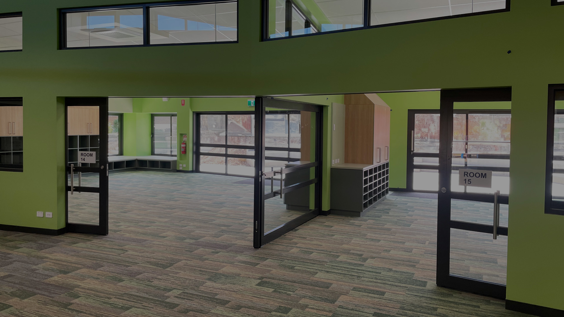 Acoustic glazed sliders installed in a school