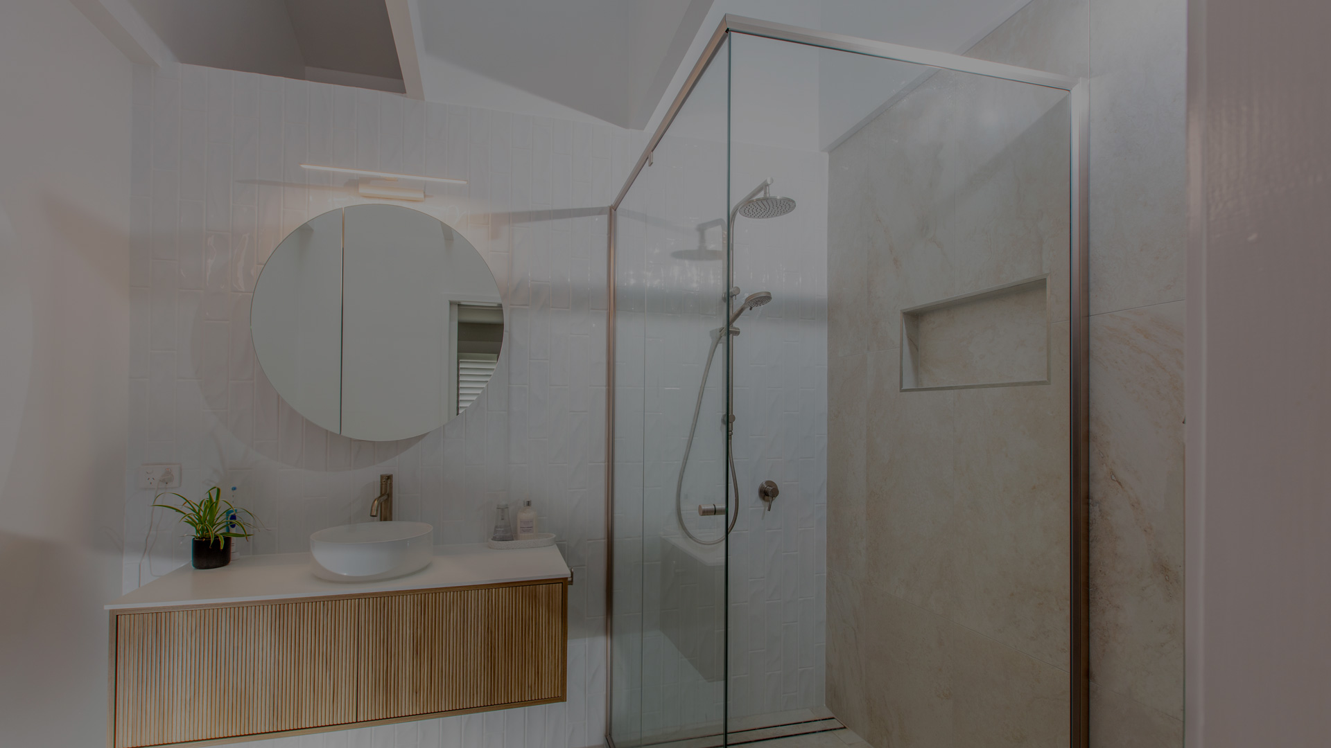 Installed Evolution shower screen system in brushed nickel